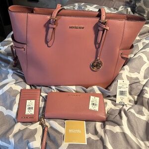 Authentic Michael Kors Rose colored handbag and accessories